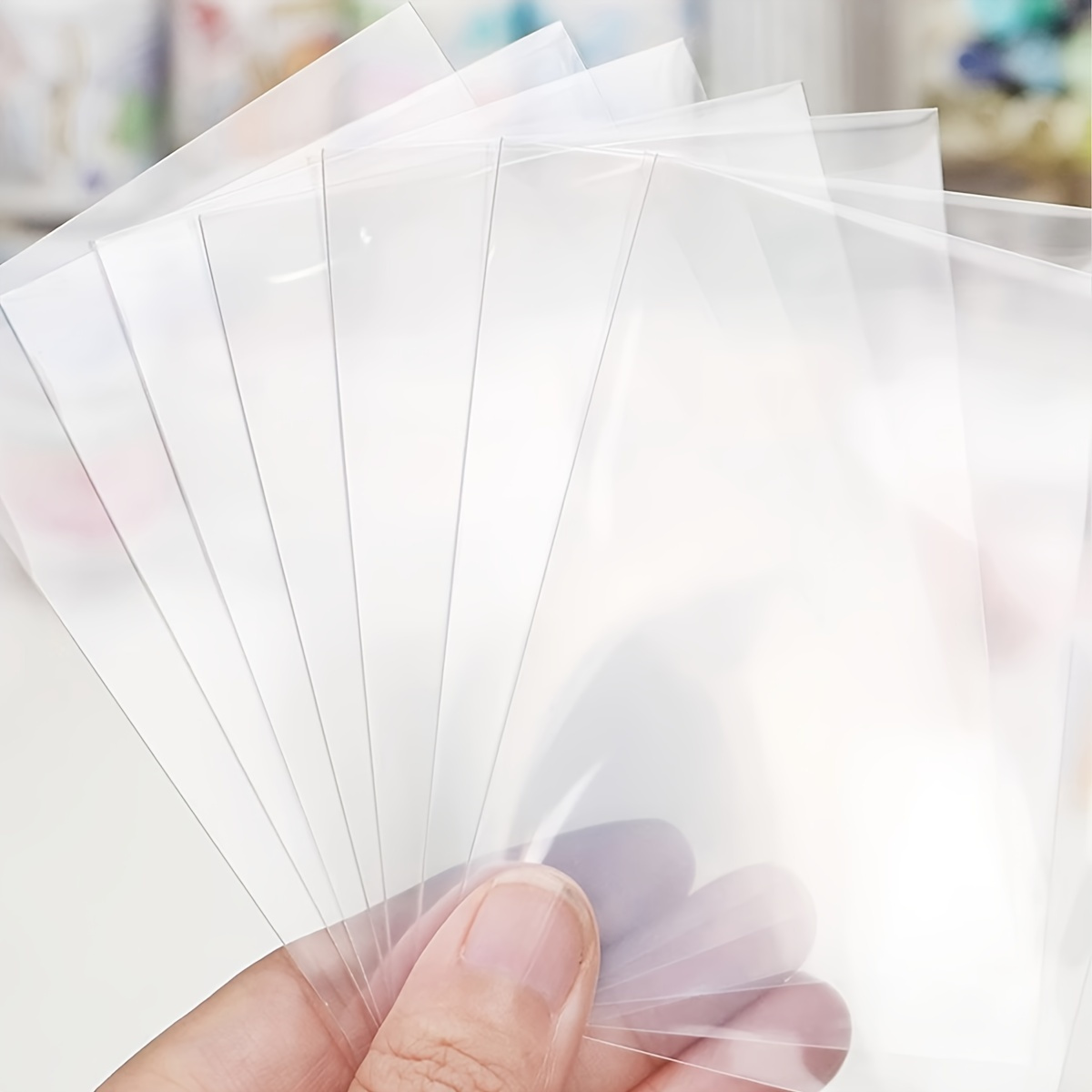 50/100pcs high-definition card - مراجعة Card Sleeves Protector وسعره